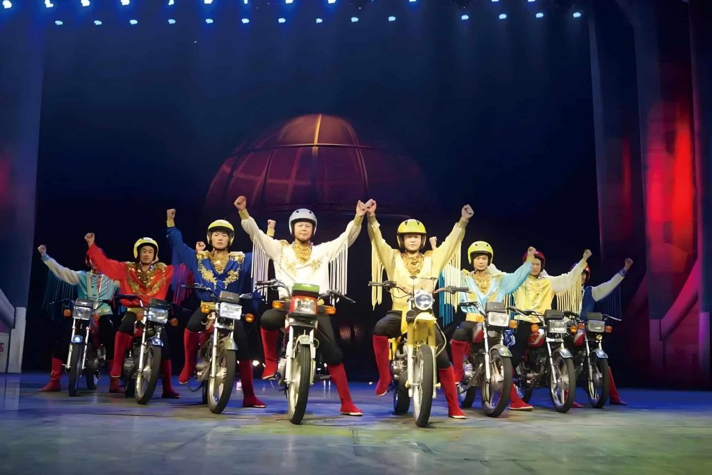 Six motorcycles performing simultaneously inside steel cage at Chaoyang Theatre Beijing